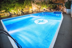 Outdoor pool, sun loungers