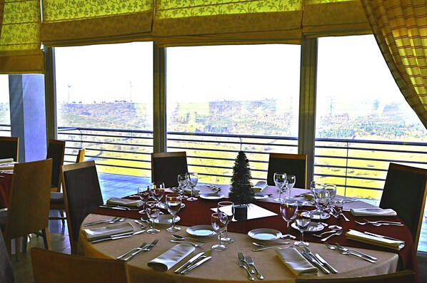 Breakfast, lunch, dinner served; Portuguese cuisine, garden views 