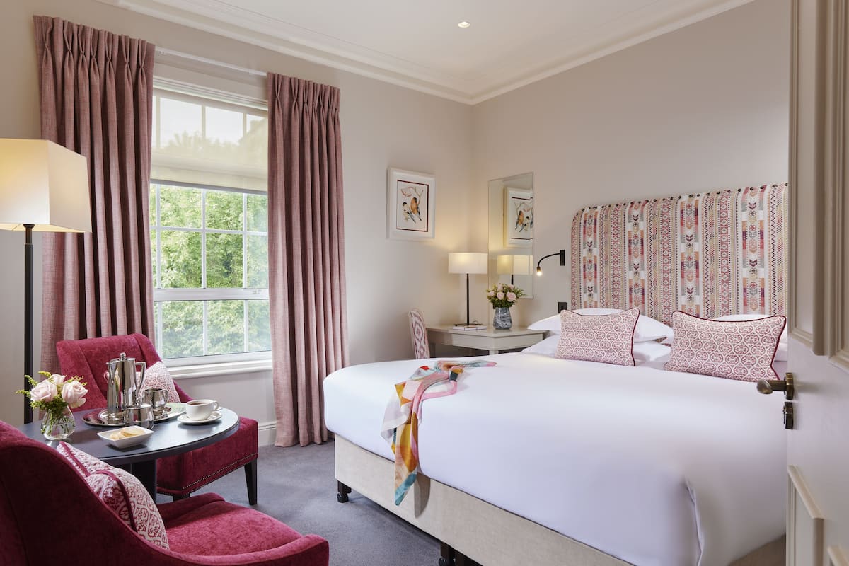 hypo-allergenic bedding, desk, laptop workspace, iron/ironing board