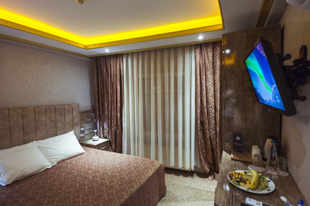 Camera | Biancheria da letto di alta qualità, minibar, una cassaforte in camera
