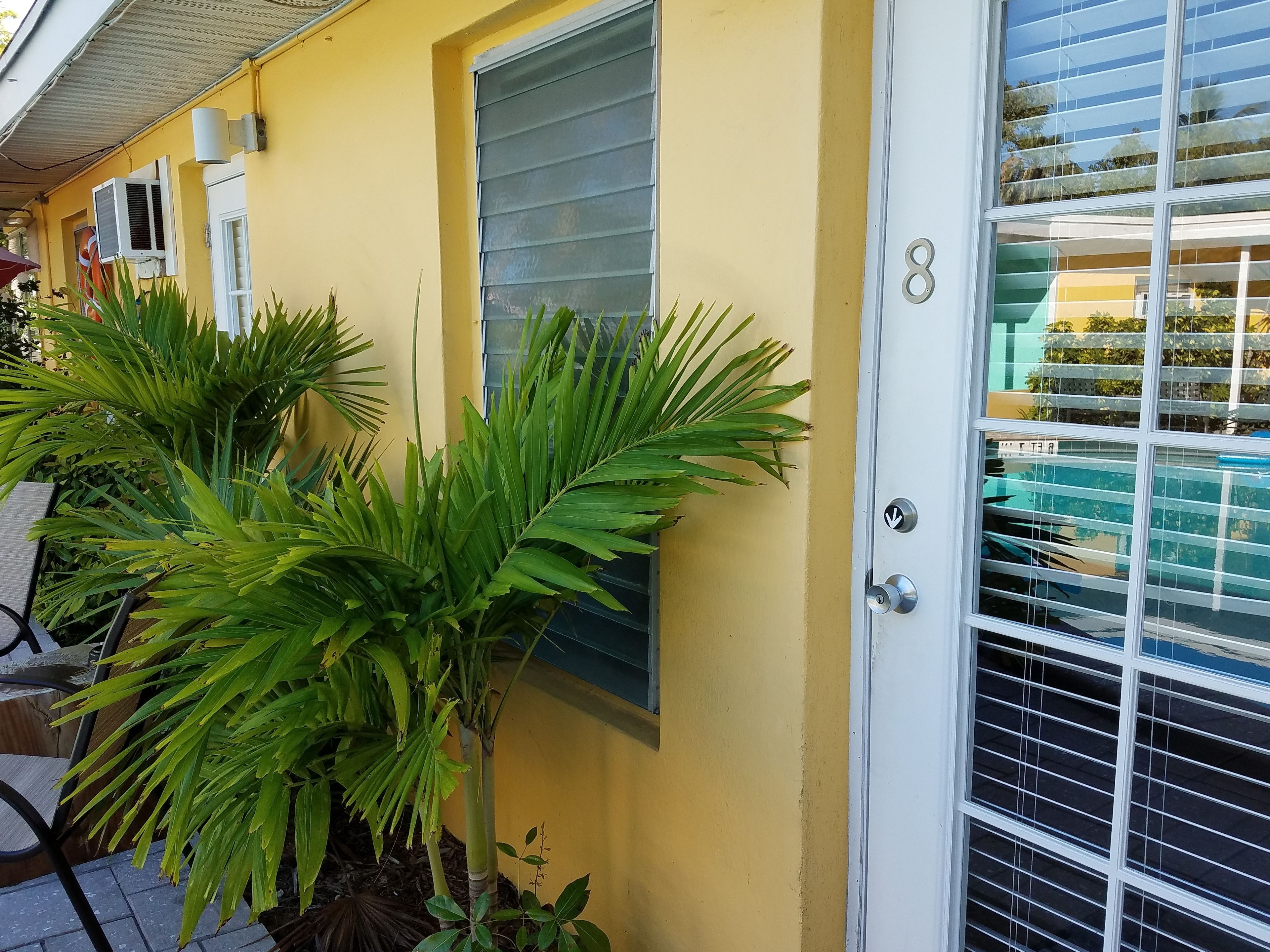 queen suite #8, full kitchen, ground floor, pool view, private bathroom | 1 bedroom, individually decorated, individually furnished