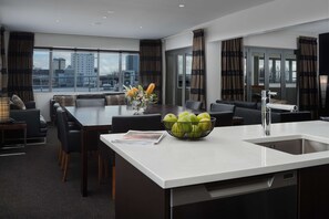 Two Bedroom Apartment | Minibar, in-room safe, desk, laptop workspace