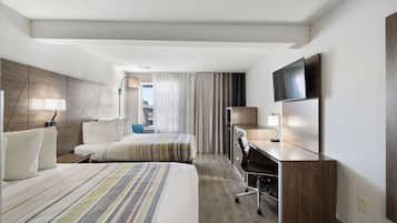 Suite, Multiple Beds, Non Smoking | Premium bedding, desk, laptop workspace, blackout drapes