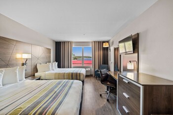 Premium Room, 2 Queen Beds, Non Smoking | Premium bedding, desk, laptop workspace, blackout drapes at Country Inn & Suites by Radisson, Myrtle Beach, SC