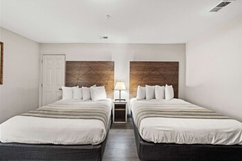 Premium bedding, desk, laptop workspace, blackout drapes at Country Inn & Suites by Radisson, Myrtle Beach, SC