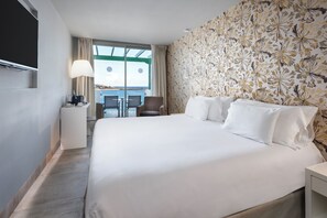 Ropa de cama de alta calidad, minibar, escritorio y cortinas blackout 