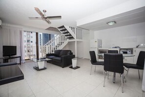 Superior Apartment (Split Level) | Living area | 32-inch LCD TV with cable channels, TV