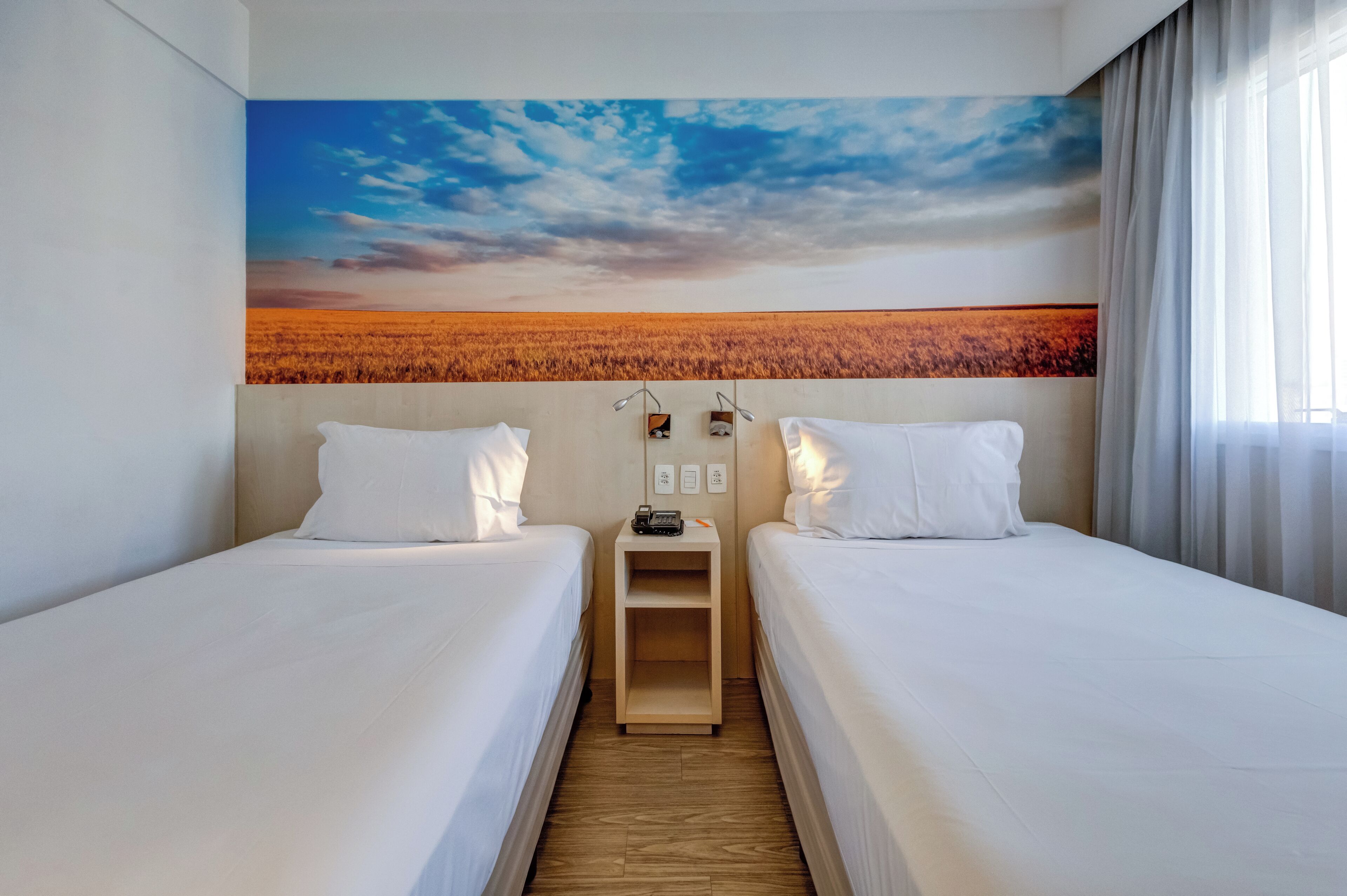 Superior Twin Room | Minibar, in-room safe, desk, blackout curtains