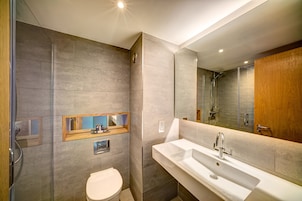 Shower, eco-friendly toiletries, hair dryer, towels