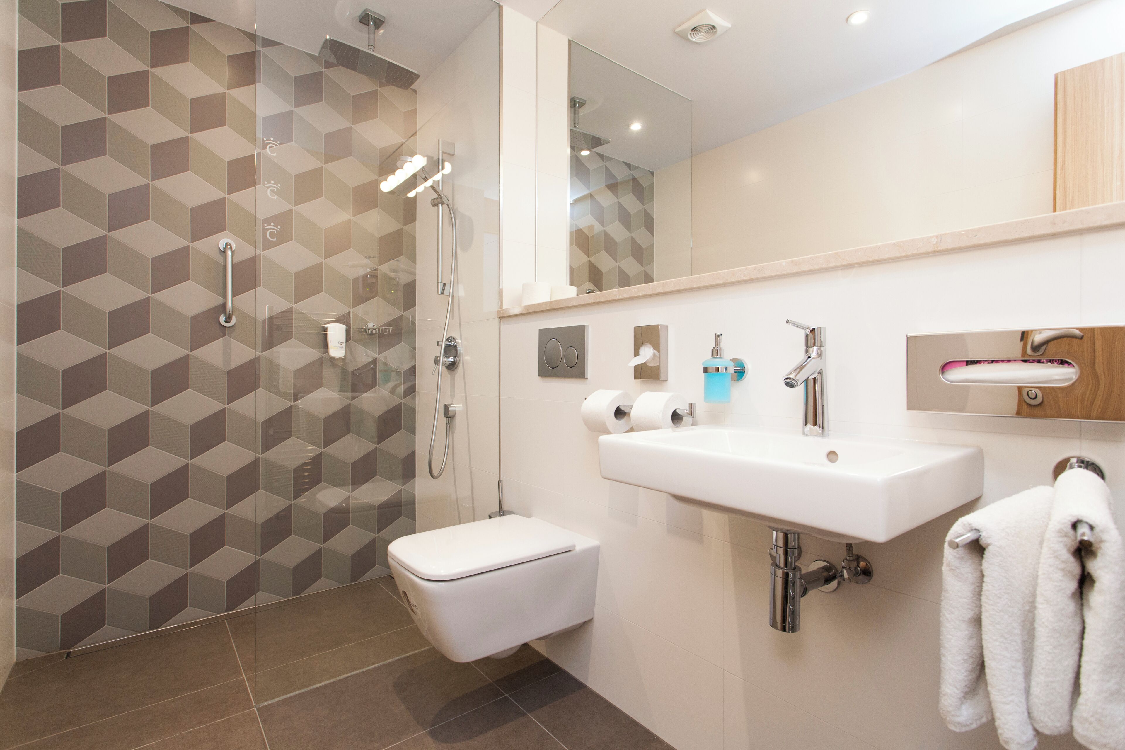 hair dryer, towels, soap, shampoo