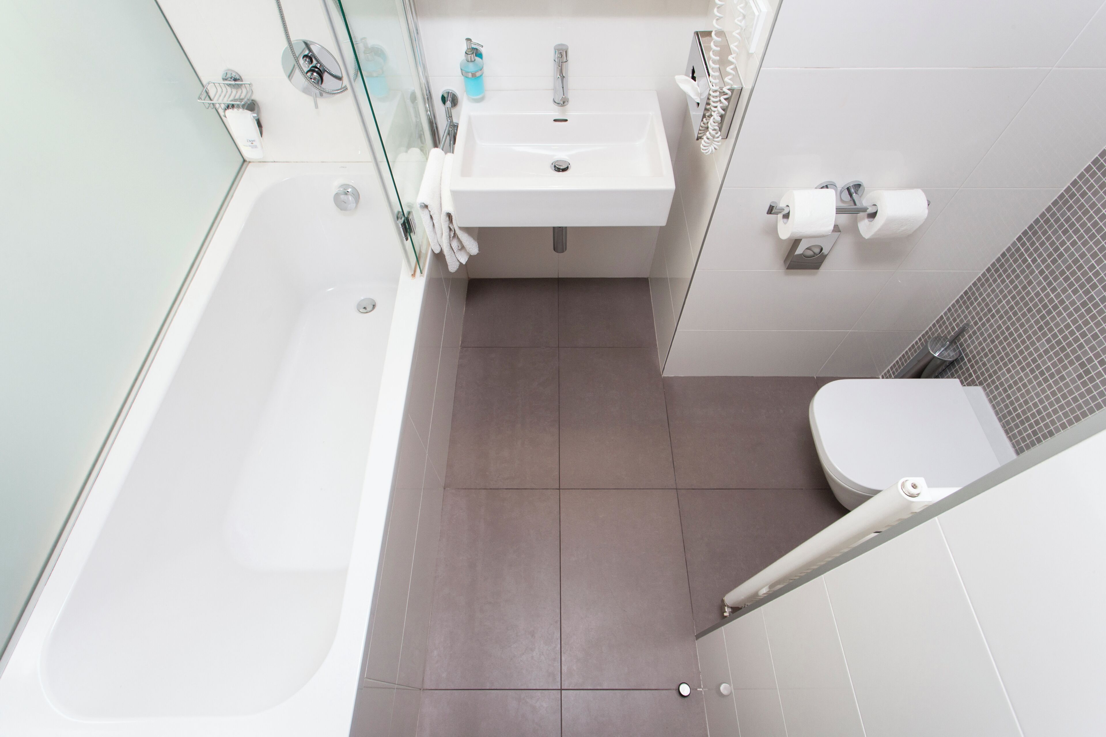 deluxe room | bathroom | hair dryer, towels, soap, shampoo