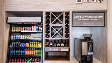 A beverage vending machine with a 'CHILLED' section, a wine cooler, and a specialty coffee machine.