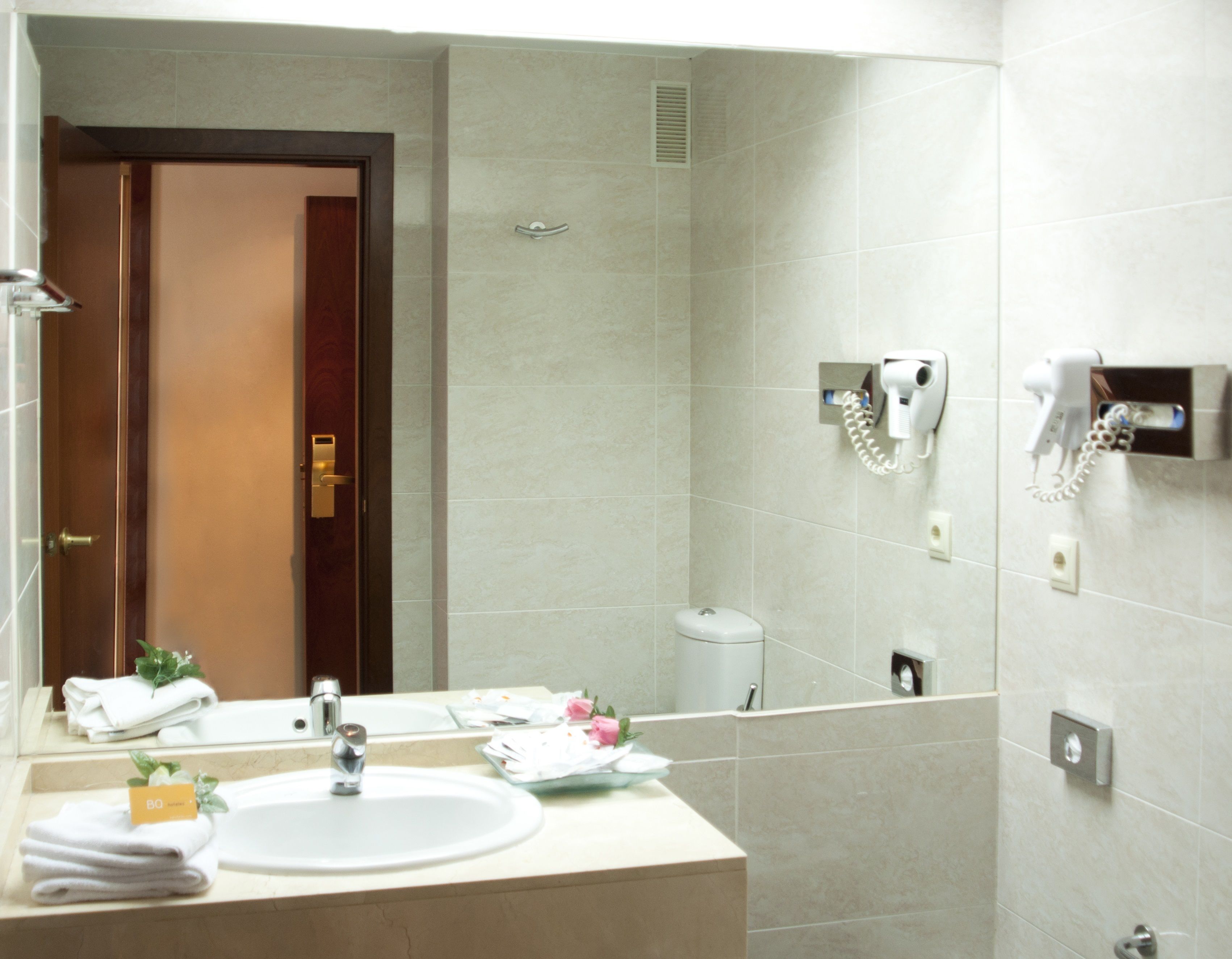 hair dryer, bidet, towels