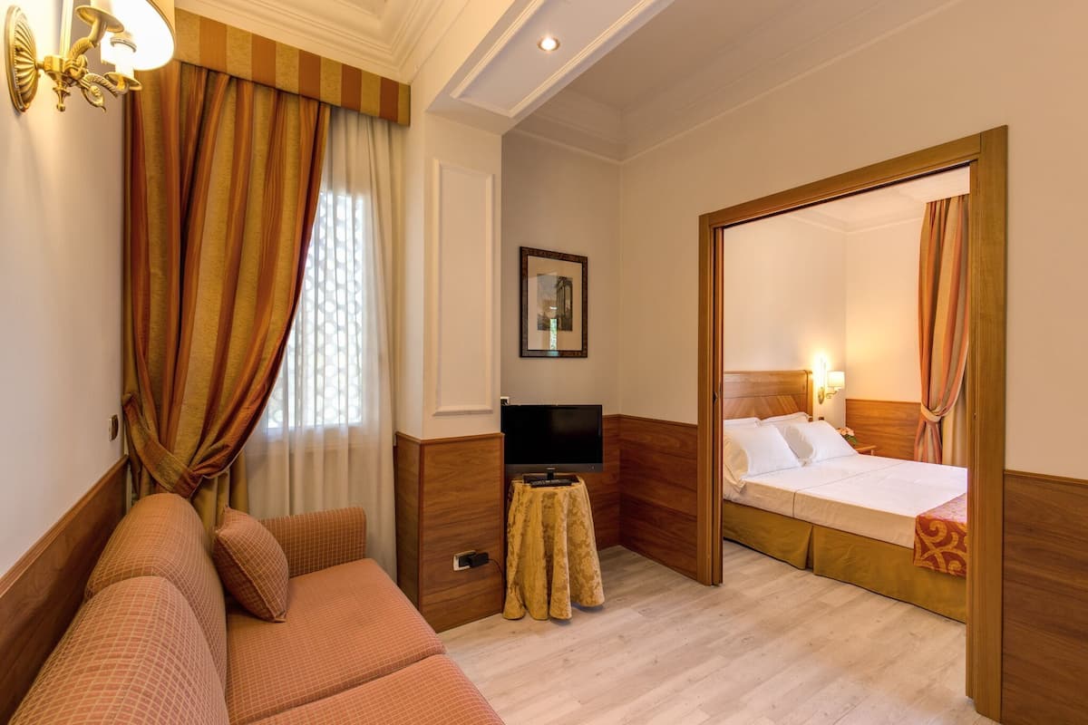 Quadruple Room | Premium bedding, in-room safe, desk, soundproofing