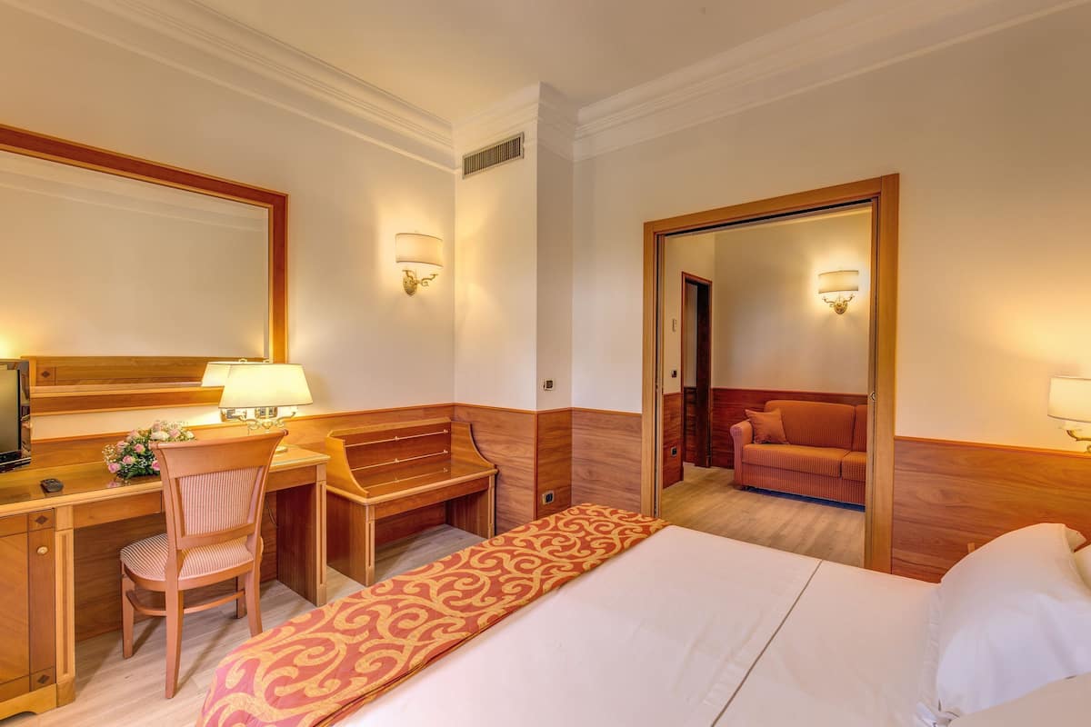 Family Room | Premium bedding, in-room safe, desk, soundproofing