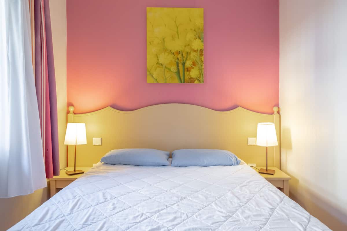 Blackout curtains, free WiFi, bed sheets