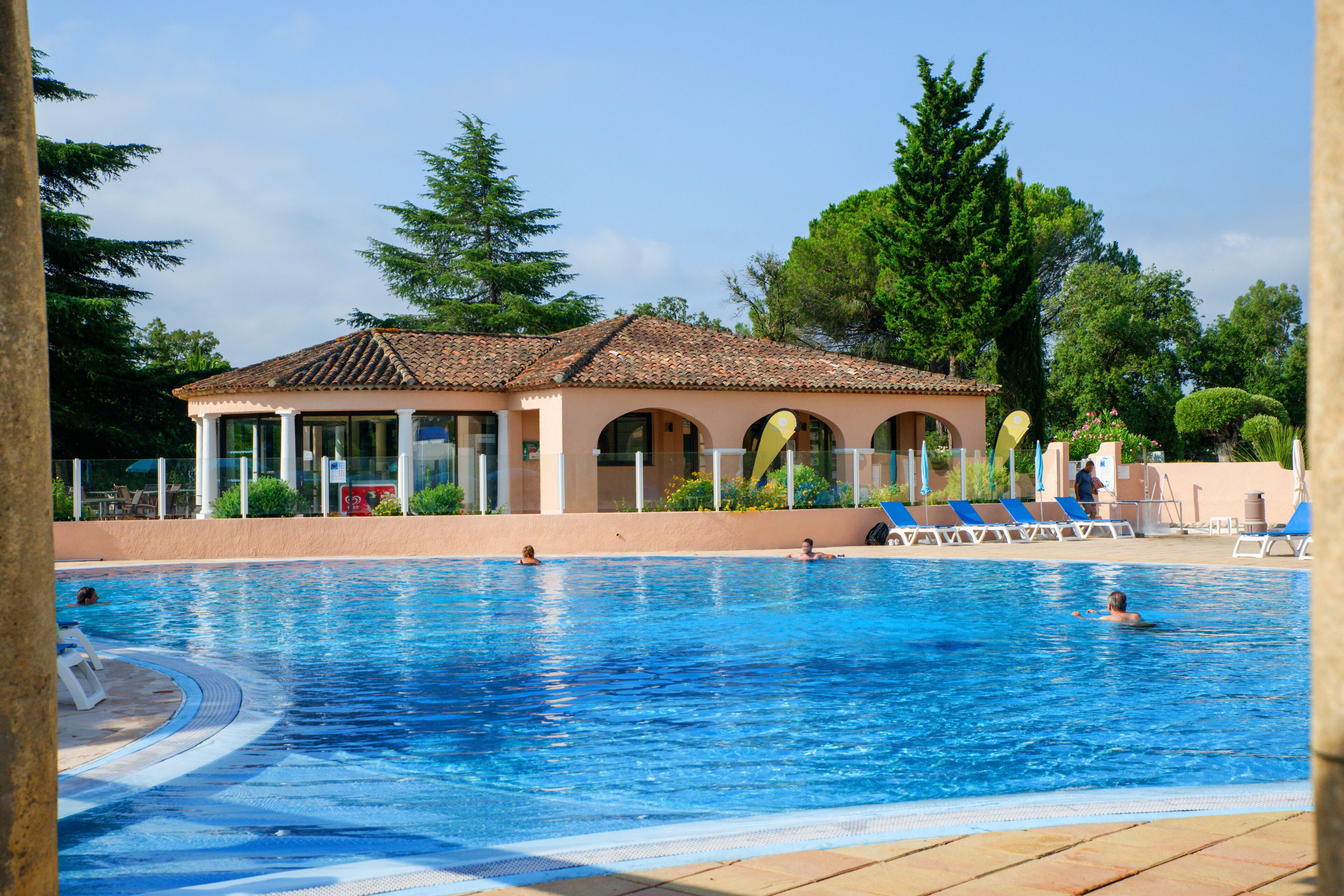 Seasonal outdoor pool, pool umbrellas, pool loungers