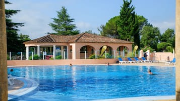 Seasonal outdoor pool, pool umbrellas, pool loungers