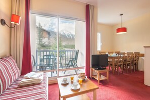 Appartement 6 personnes - 1 chambre + 1 coin nuit - Balcon | Salle de séjour