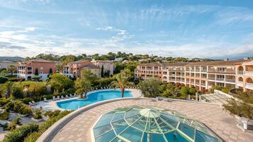 Seasonal outdoor pool, pool umbrellas, pool loungers