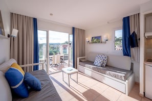 Appartement 4 personnes - 1 chambre - Terrasse ou balcon - Vue mer | Coin séjour | Télévision