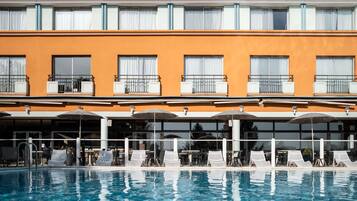 Seasonal outdoor pool, pool loungers