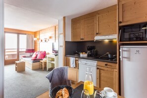Appartement 7 personnes - 2 chambres + 1 coin nuit | Coin séjour