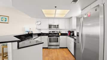 Standard Condo | Private kitchen | Full-size fridge, microwave, stovetop, dishwasher