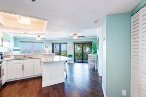 Deluxe Condo, Beach View | Private kitchen | Full-size fridge, microwave, stovetop, dishwasher