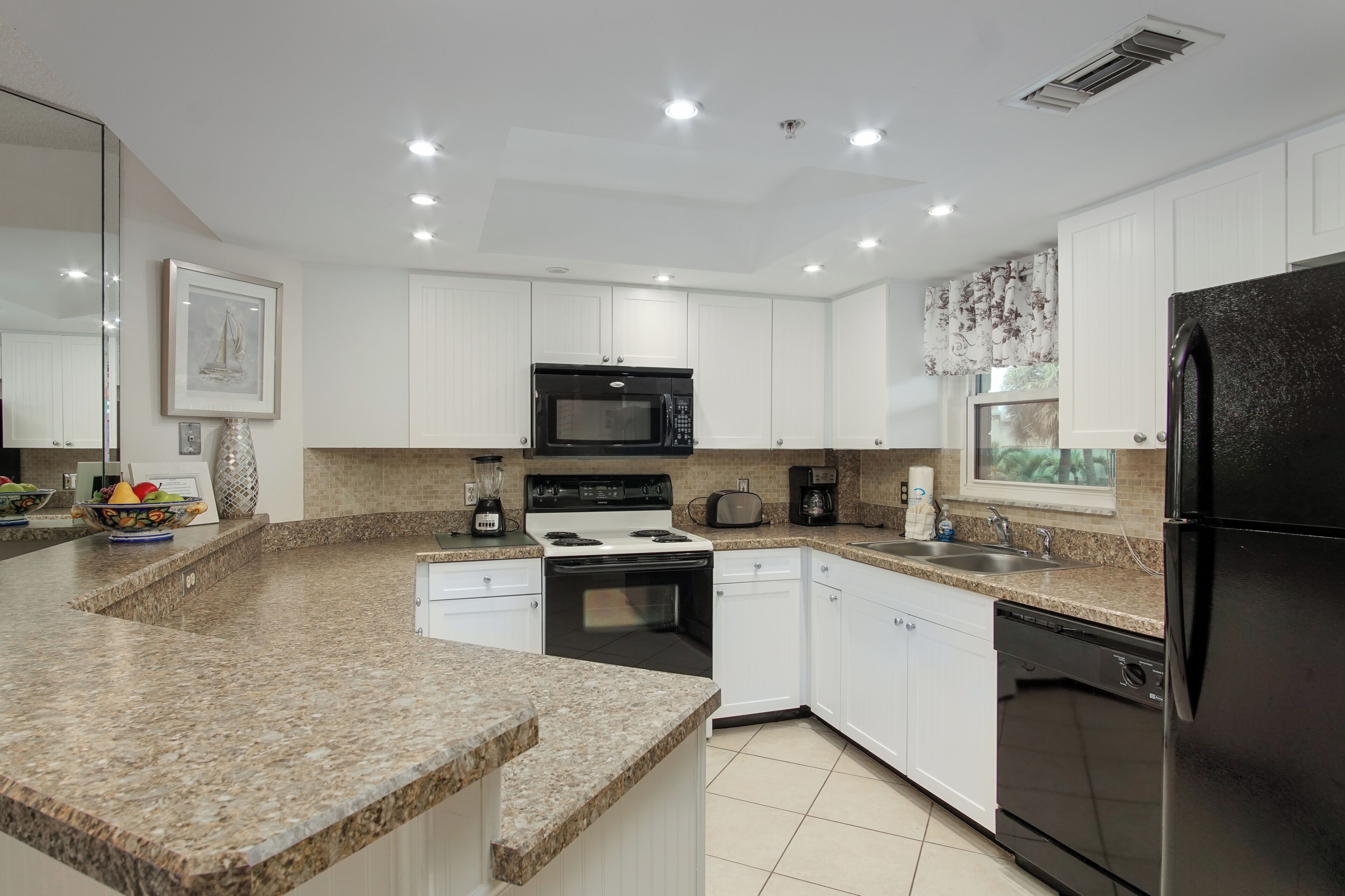 Standard Condo | Private kitchen | Full-size fridge, microwave, stovetop, dishwasher