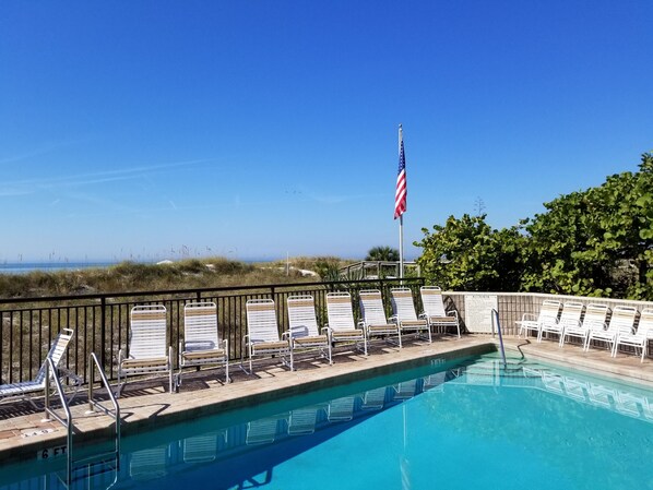 Outdoor pool, a heated pool, pool loungers