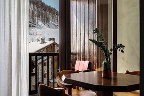 Suite Glacier with balcony | Living area | Flat-screen TV - Experimental Chalet Val d’Isère (Val-d'Isere)