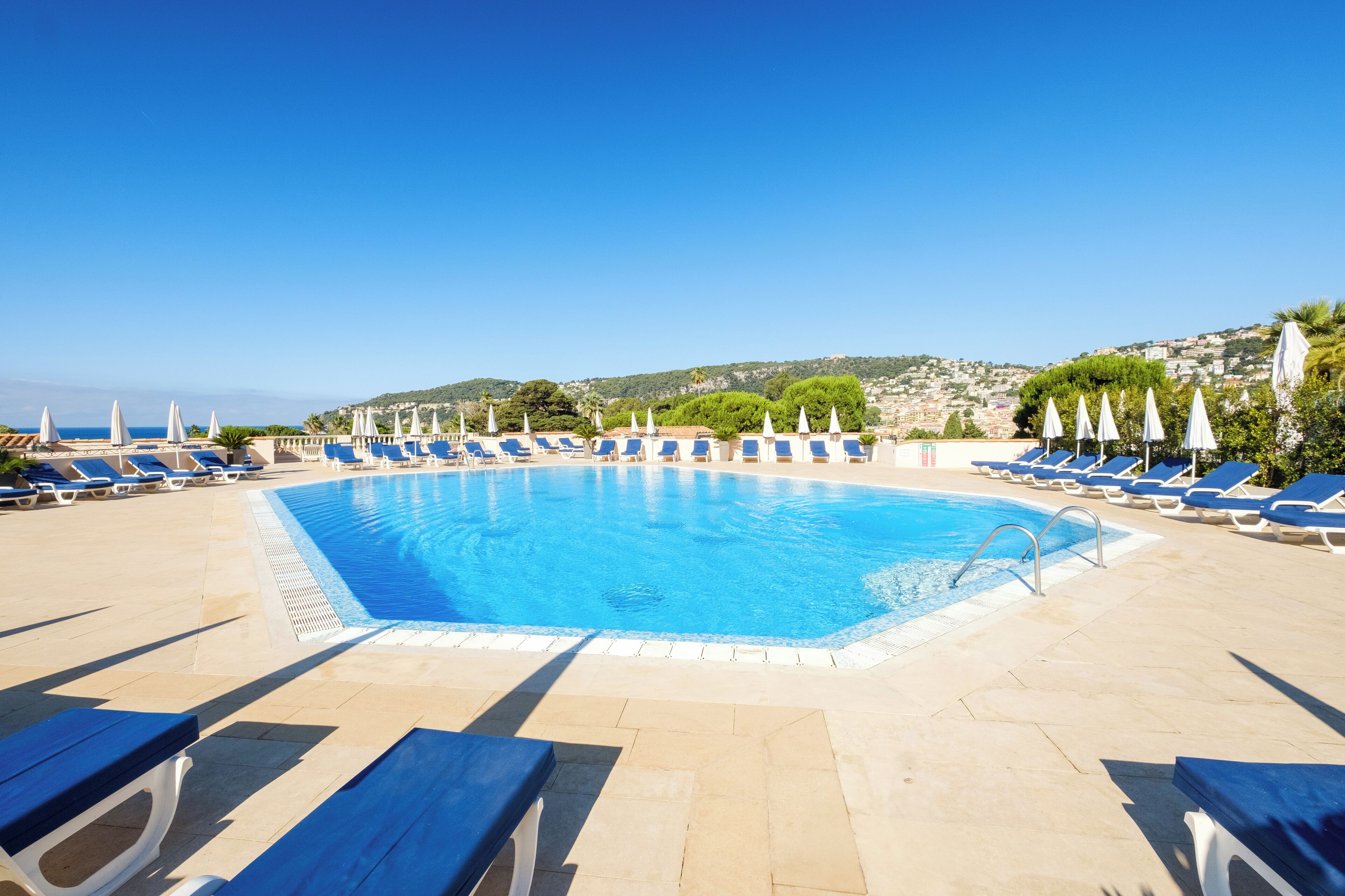Seasonal outdoor pool, pool umbrellas, sun loungers