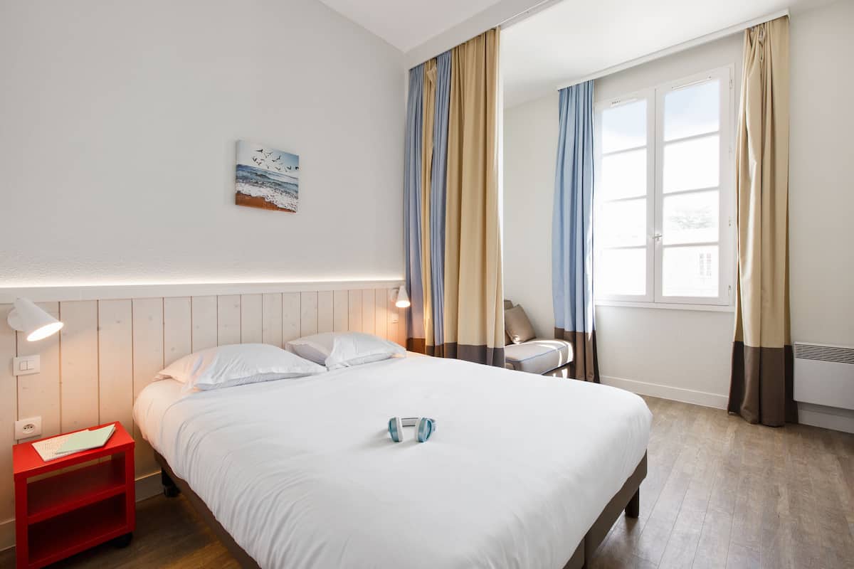 Apartemen, 1 kamar tidur | Setrika/meja setrika, Wi-Fi gratis, dan seprai linen