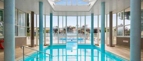 Indoor pool, open 9:00 AM to 7:00 PM, pool umbrellas, sun loungers