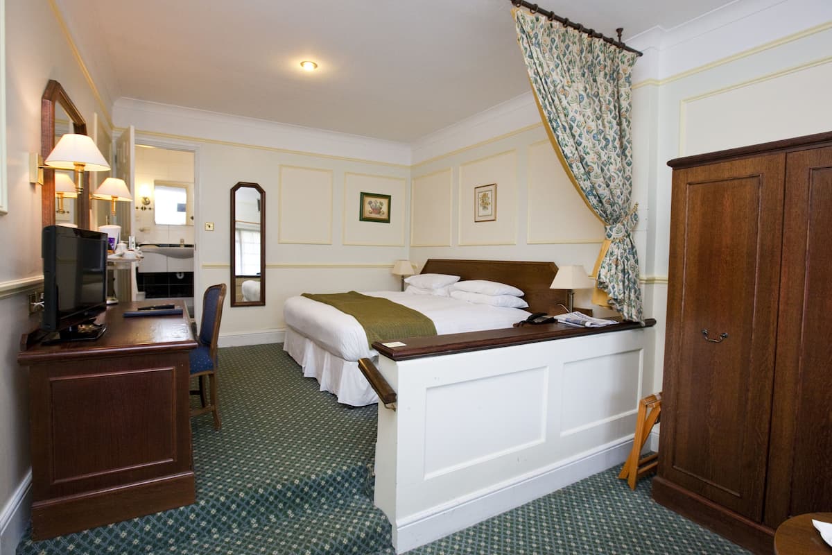 premium bedding, pillow-top beds, individually decorated, desk