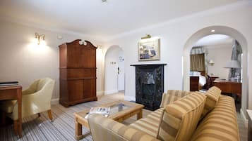 Executive Suite | Living area | 19-inch Smart TV with digital channels, TV