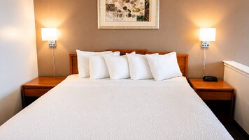 Tabla de planchar con plancha, wifi gratis, ropa de cama y despertador 