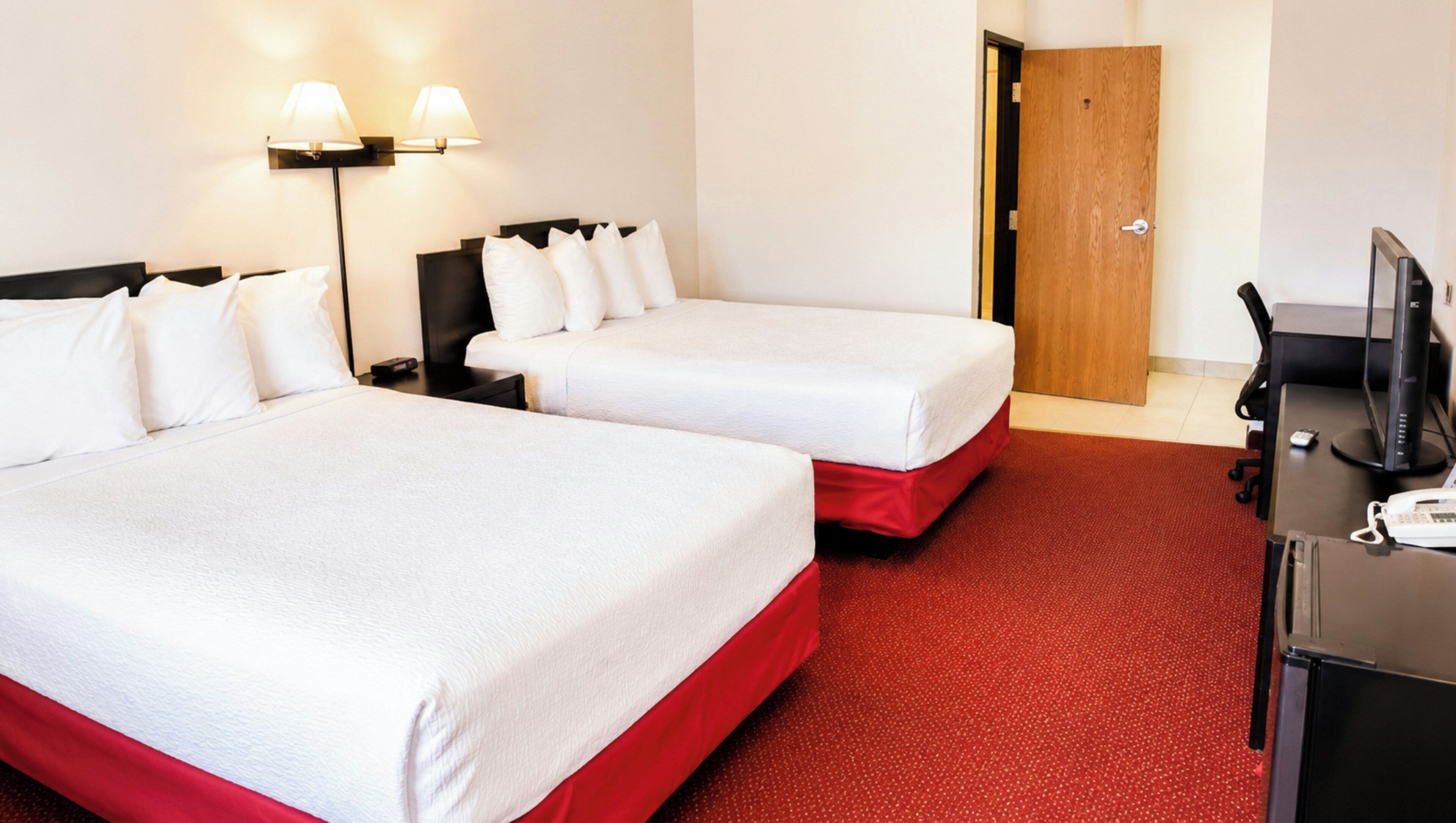 Room, 2 Queen Beds | Iron/ironing board, free WiFi, bed sheets, alarm clocks