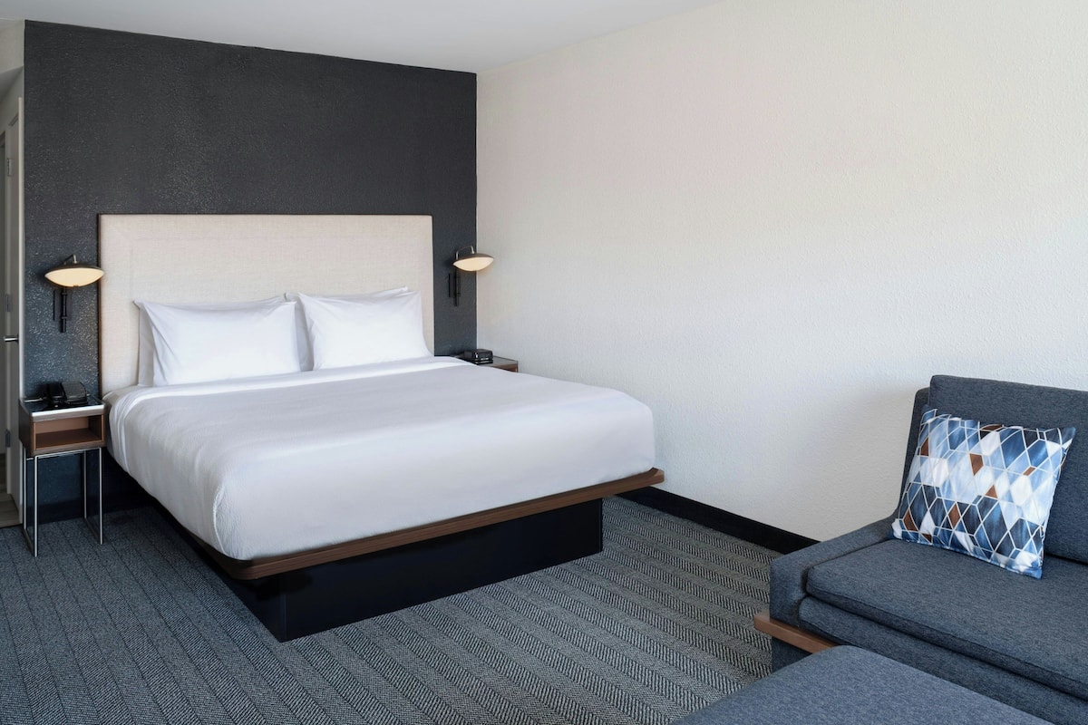 Room, 1 King Bed with Sofa bed | In-room safe, desk, laptop workspace, blackout drapes