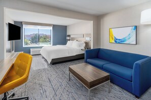 Premium bedding, pillow-top beds, desk, laptop workspace