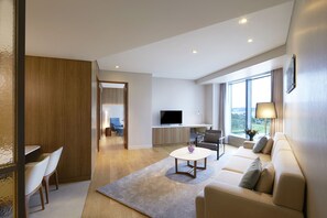 Room, 1 Bedroom (West Tower, Residence) | Living area | Flat-screen TV, iPod dock