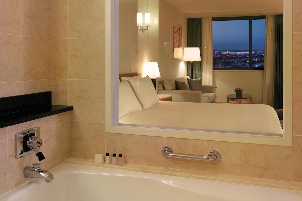 Family Room, 1 King Bed | Premium bedding, down comforters, minibar, in-room safe