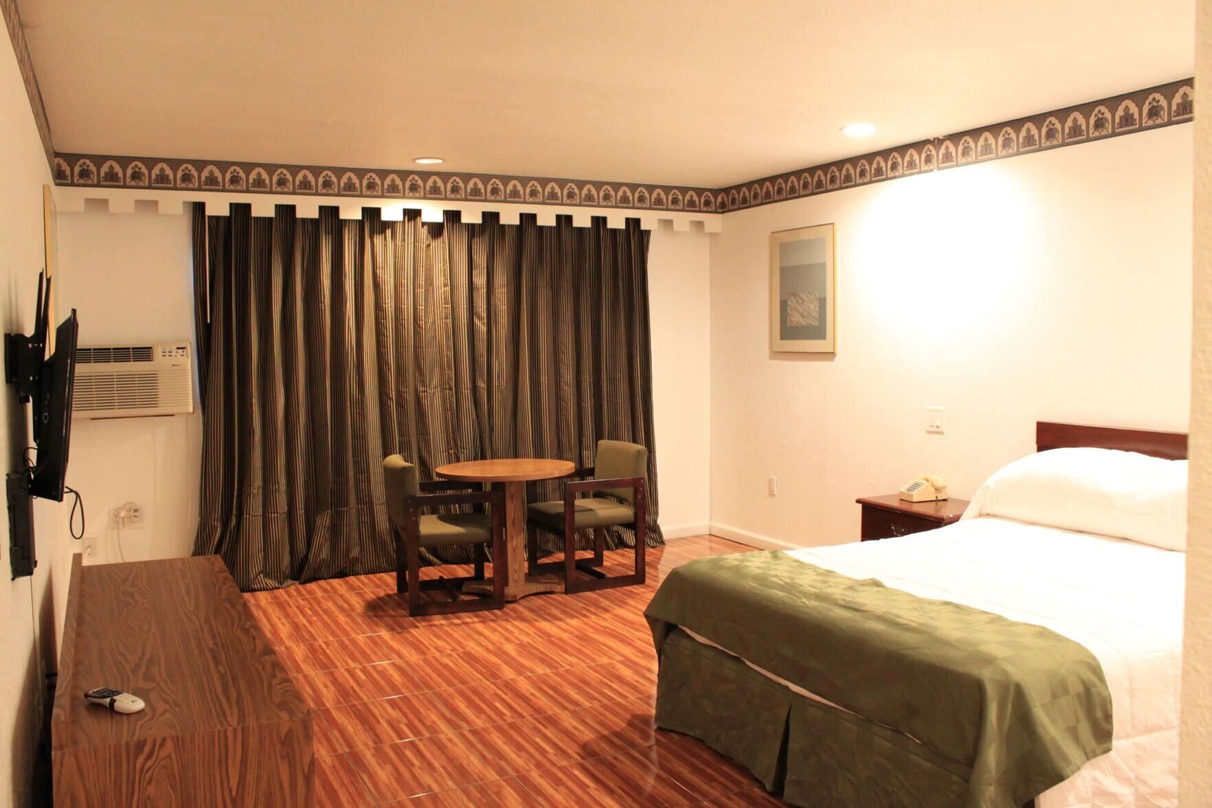 Blackout curtains, iron/ironing board, free WiFi, bed sheets