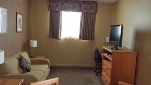 Suite, 1 King Bed, Non Smoking | Living area | 37-inch TV with cable channels, pay movies