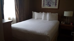 Suite, 1 Queen Bed, Non Smoking | Desk, blackout drapes, iron/ironing board, free cribs/infant beds