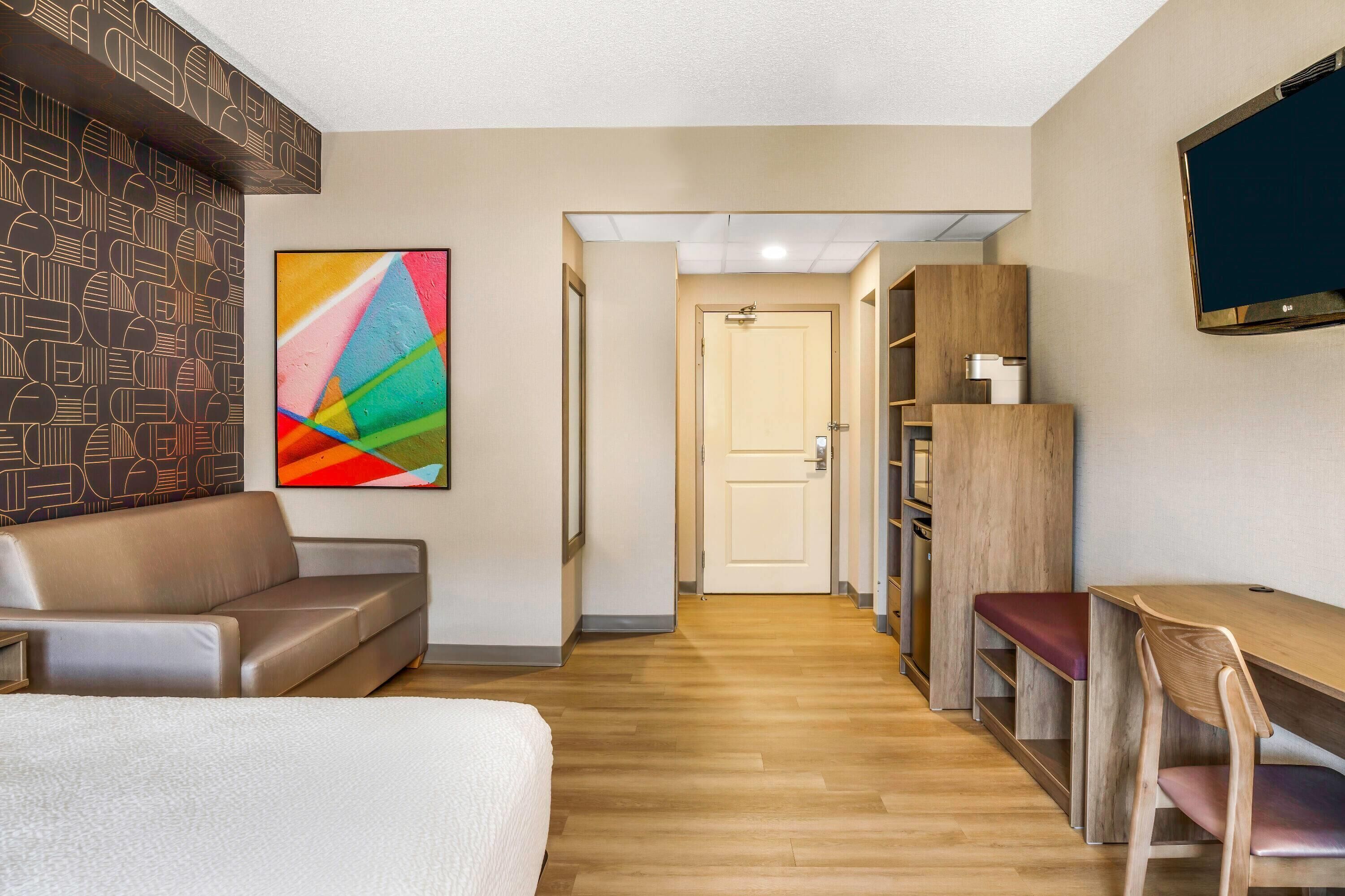 Room, 1 King Bed, Non Smoking | Desk, blackout drapes, iron/ironing board, free cribs/infant beds