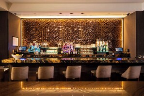 2 bars/lounges, rooftop bar