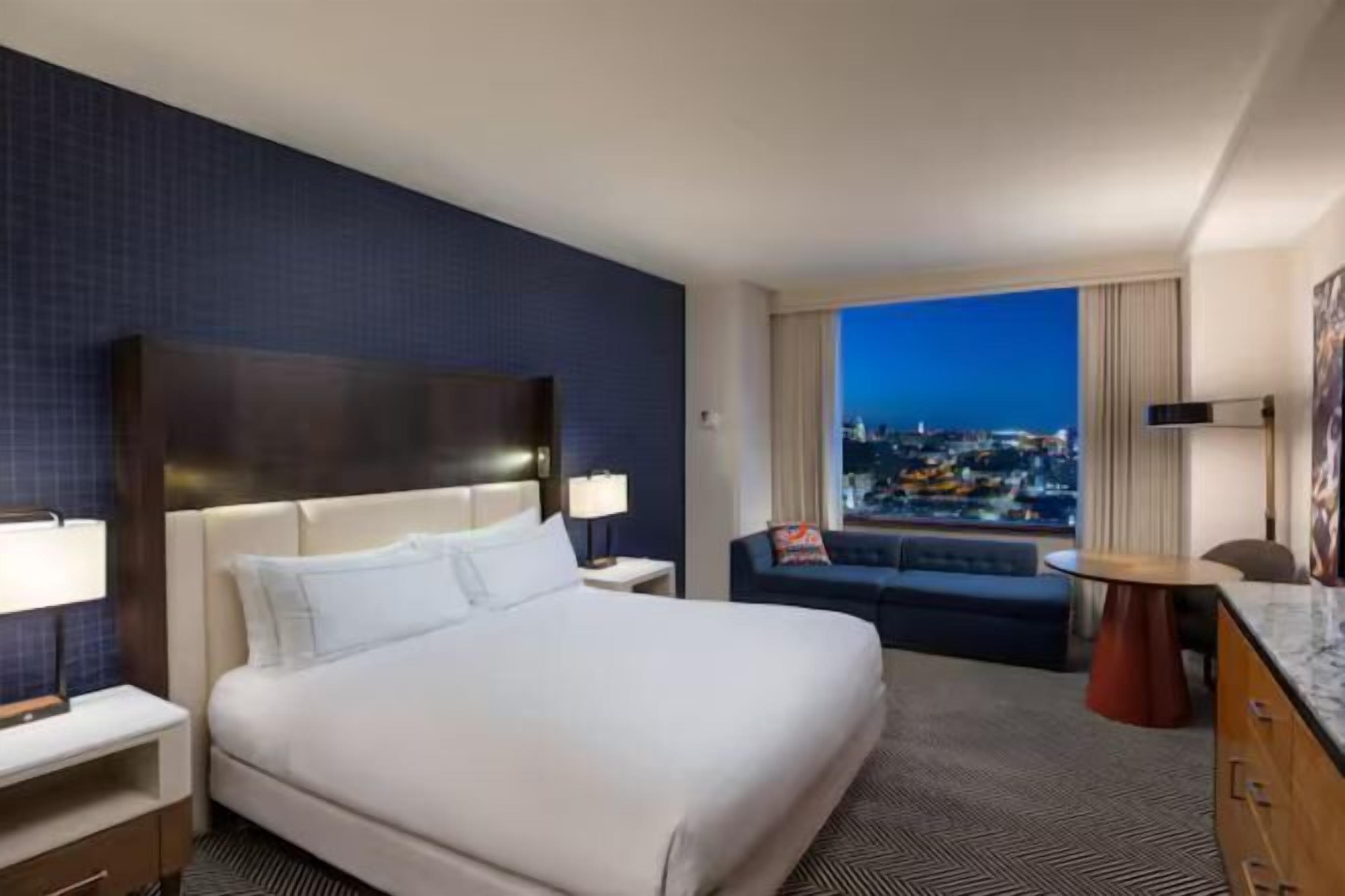 Premium bedding, pillow-top beds, in-room safe, laptop workspace