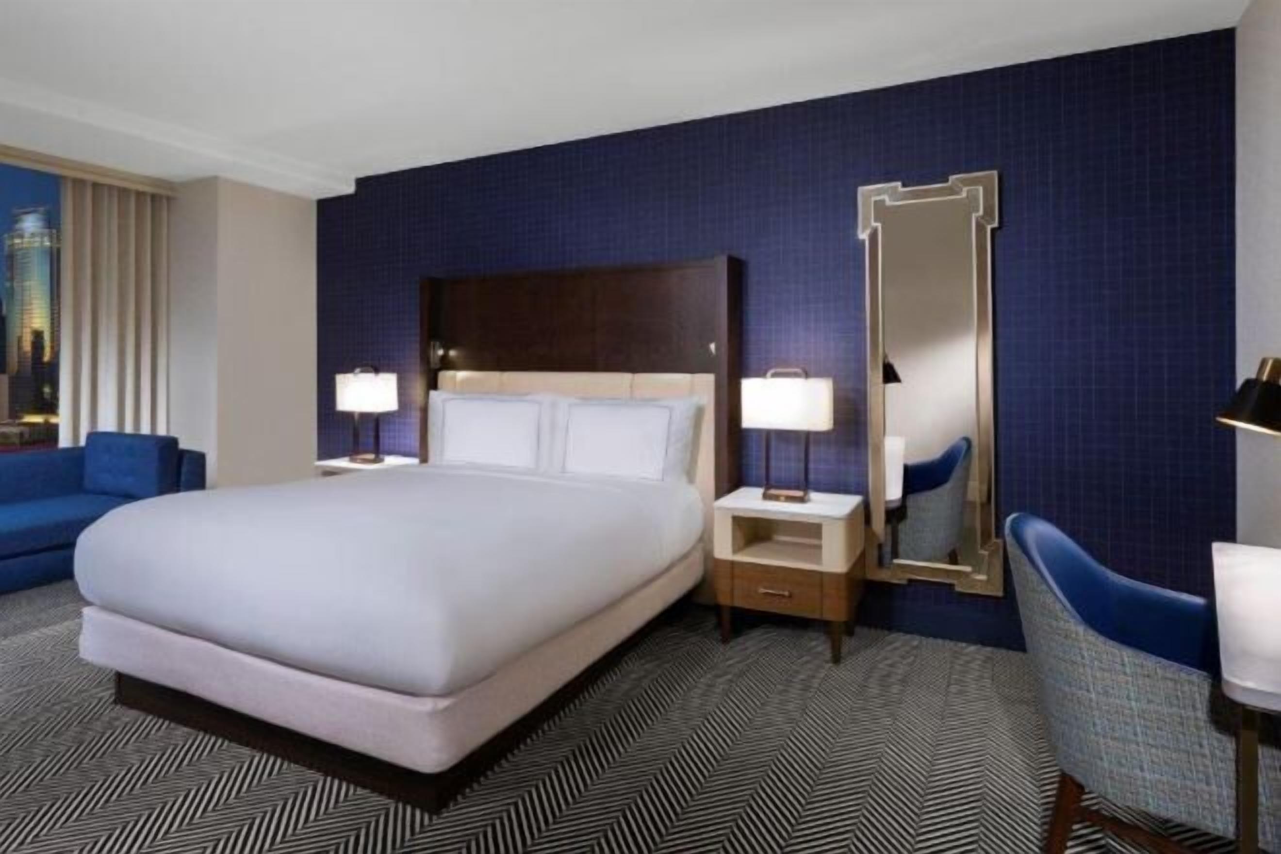 Premium bedding, pillow-top beds, in-room safe, laptop workspace